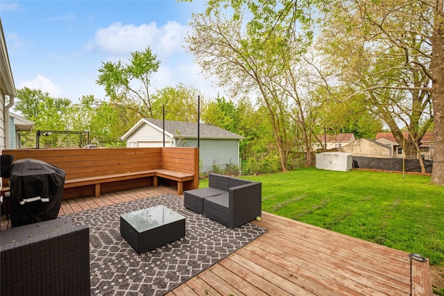 2012 61st St, Des Moines, IA 50322 - deck with a shed, area for grilling, an outdoor structure, and an outdoor living space