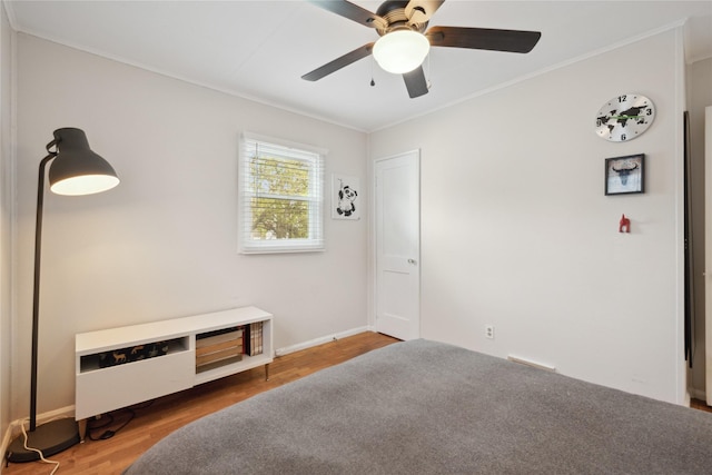 2012 61st St, Des Moines, IA 50322 - empty room with ornamental molding, a ceiling fan, wood finished floors, and baseboards