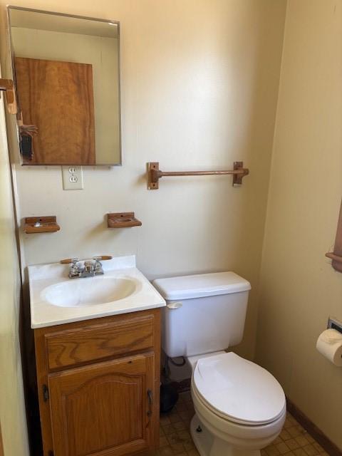 1604 Elder Dr, Marshalltown, IA 50158 - bathroom with vanity and toilet