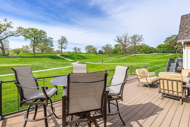 1914 Park Ave, Des Moines, IA 50315 - wooden terrace featuring outdoor dining area, golf course view, and a yard