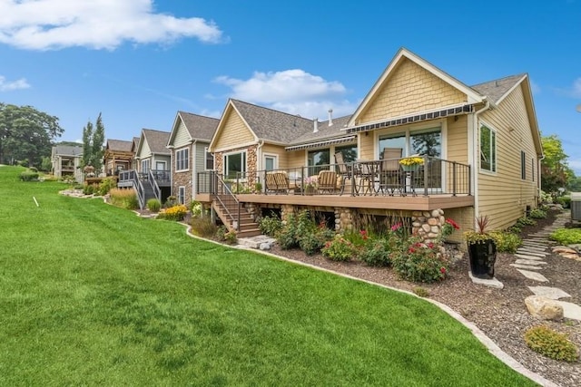 1914 Park Ave, Des Moines, IA 50315 - rear view of property with a deck, a yard, and stairway