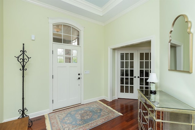 1914 Park Ave, Des Moines, IA 50315 - entryway featuring dark wood finished floors, french doors, crown molding, and baseboards