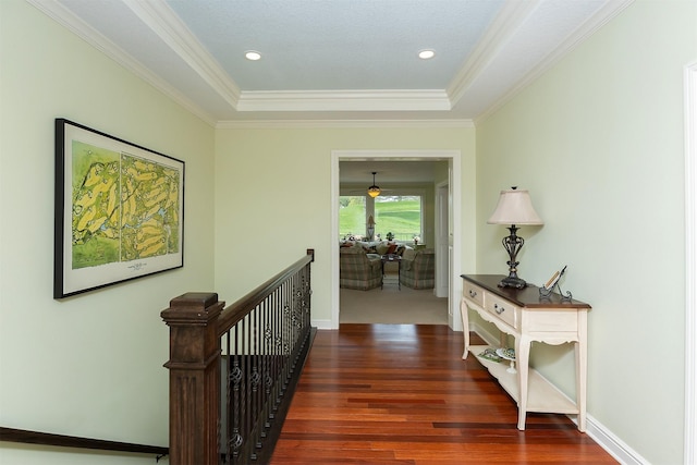 1914 Park Ave, Des Moines, IA 50315 - corridor with wood finished floors, ornamental molding, an upstairs landing, a raised ceiling, and recessed lighting