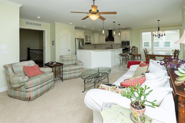1914 Park Ave, Des Moines, IA 50315 - living area with a ceiling fan, crown molding, a chandelier, recessed lighting, and baseboards