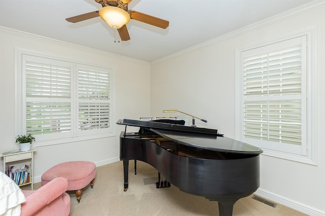 1914 Park Ave, Des Moines, IA 50315 - sitting room featuring crown molding, baseboards, carpet flooring, and ceiling fan