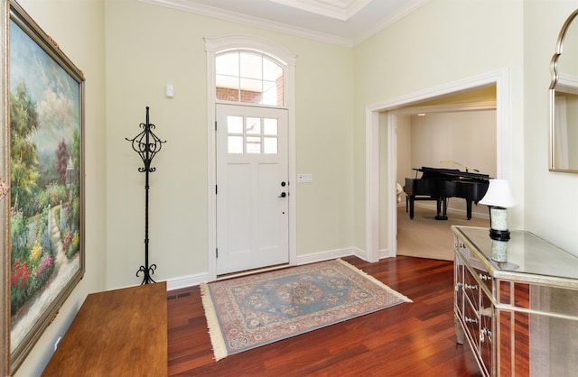1914 Park Ave, Des Moines, IA 50315 - entryway with dark wood finished floors and ornamental molding