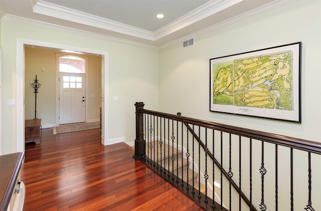 1914 Park Ave, Des Moines, IA 50315 - corridor featuring wood finished floors, an upstairs landing, crown molding, a tray ceiling, and recessed lighting