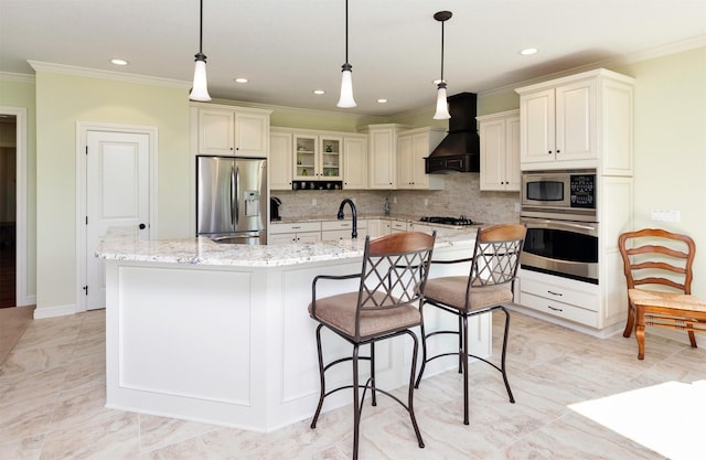 1914 Park Ave, Des Moines, IA 50315 - kitchen featuring stainless steel appliances, custom exhaust hood, ornamental molding, tasteful backsplash, and hanging light fixtures