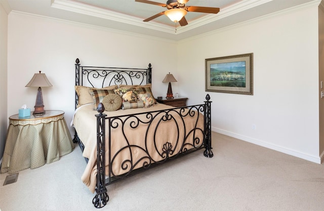 1914 Park Ave, Des Moines, IA 50315 - bedroom featuring a raised ceiling, ornamental molding, carpet floors, and ceiling fan