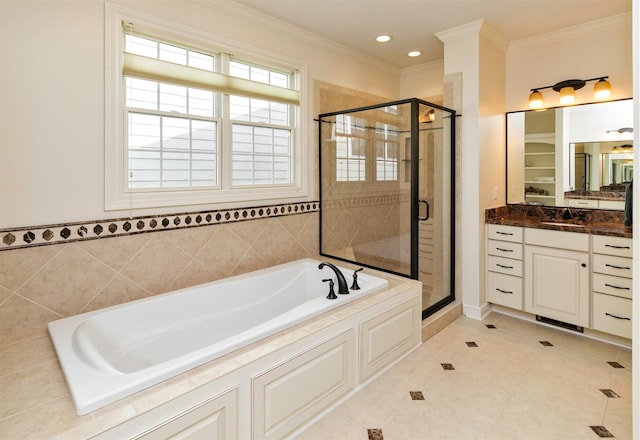 1914 Park Ave, Des Moines, IA 50315 - full bath featuring a garden tub, a shower stall, vanity, crown molding, and tile patterned floors