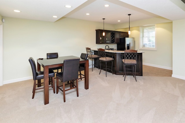 1914 Park Ave, Des Moines, IA 50315 - dining room featuring light carpet, wet bar, and recessed lighting