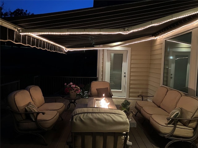 1914 Park Ave, Des Moines, IA 50315 - deck at twilight featuring an outdoor living space