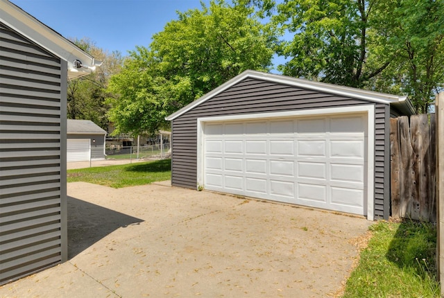 detached garage with fence