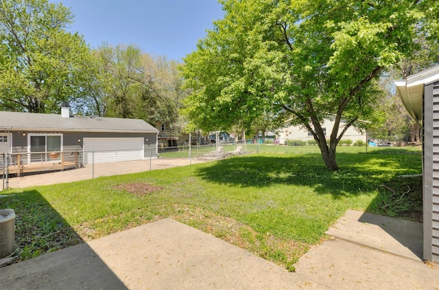view of yard featuring a garage