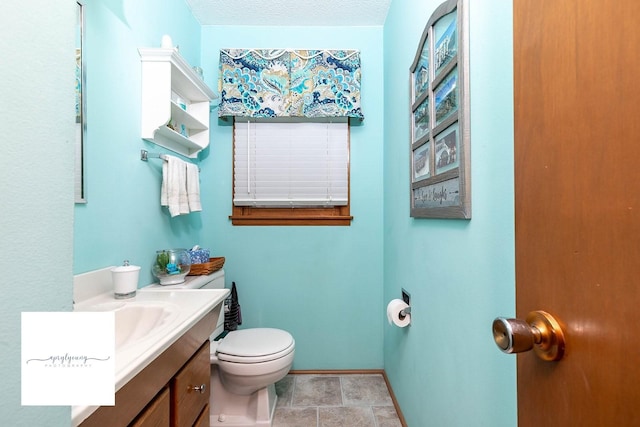 6404 Meredith Dr, Urbandale, IA 50322 - half bath with toilet, vanity, and baseboards
