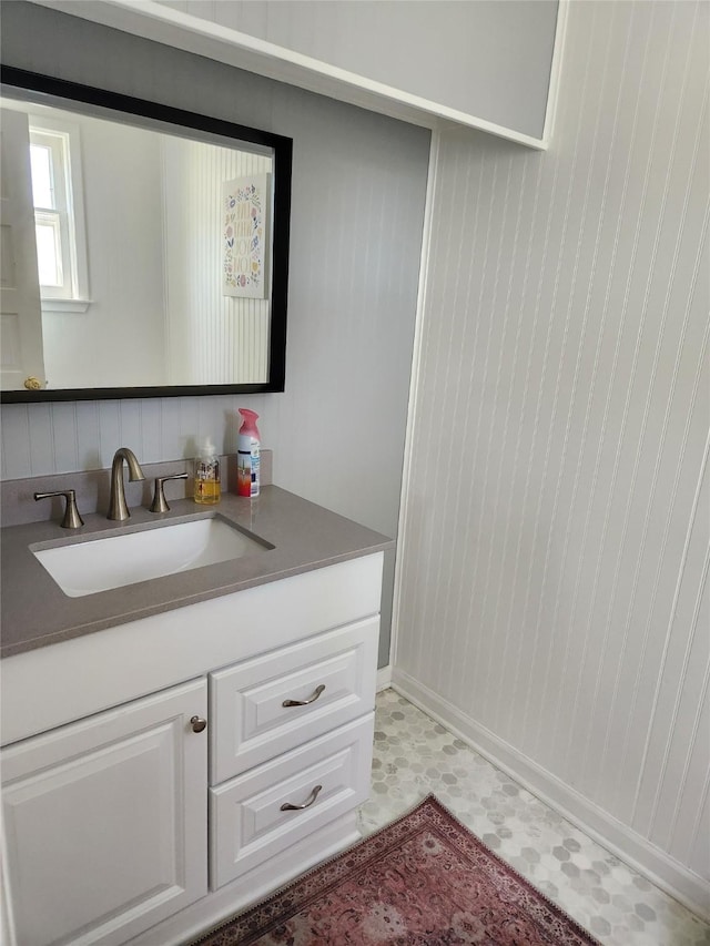 903 Greene St, Adel, IA 50003 - bathroom featuring tile patterned floors and vanity