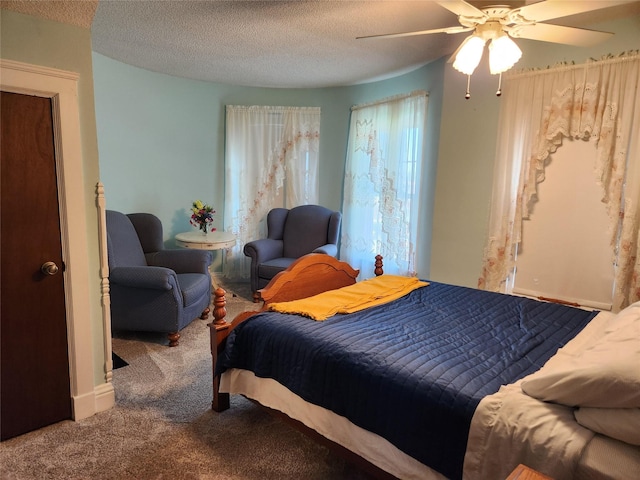 903 Greene St, Adel, IA 50003 - bedroom featuring carpet flooring, ceiling fan, and a textured ceiling