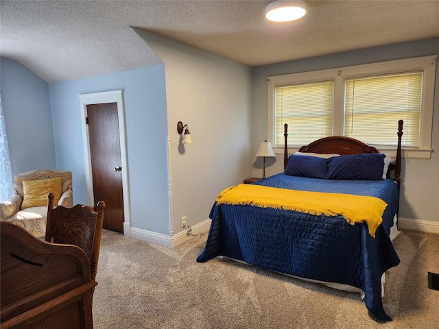 903 Greene St, Adel, IA 50003 - bedroom featuring carpet floors, a textured ceiling, and baseboards