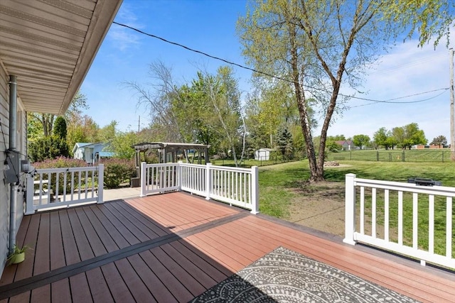 515 Kingman Blvd, Madrid, IA 50156 - deck featuring a lawn