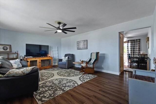 515 Kingman Blvd, Madrid, IA 50156 - living room featuring wood finished floors, ceiling fan, and baseboards