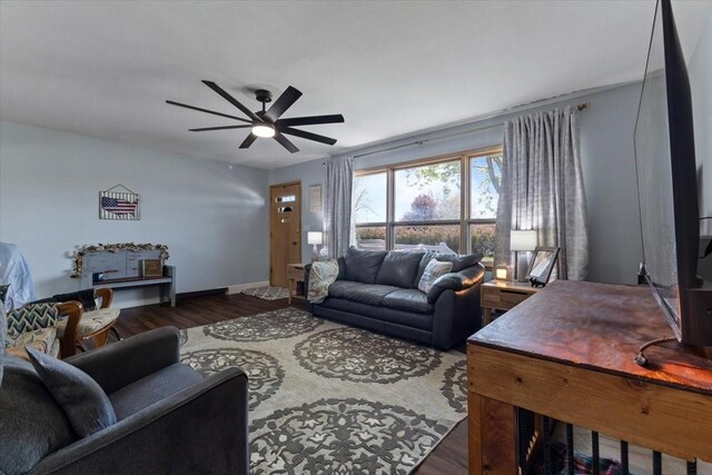 515 Kingman Blvd, Madrid, IA 50156 - living area with wood finished floors, ceiling fan, and baseboards