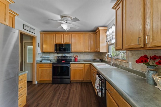 515 Kingman Blvd, Madrid, IA 50156 - kitchen featuring appliances with stainless steel finishes, a sink, dark wood-style flooring, ceiling fan, and backsplash