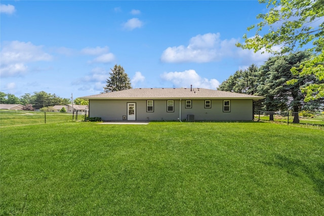 612 W Pleasant St, Pleasantville, IA 50225 - back of property featuring a patio and central AC