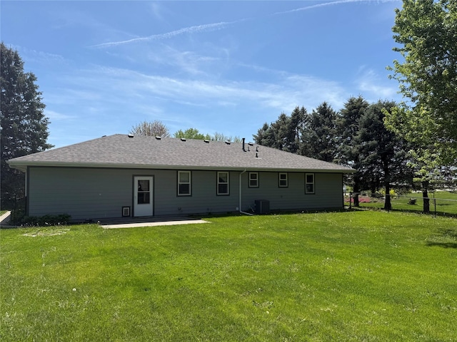 612 W Pleasant St, Pleasantville, IA 50225 - back of house with a patio area and central AC