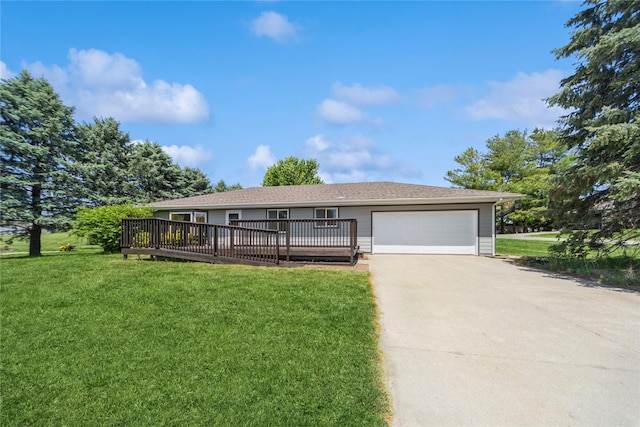 612 W Pleasant St, Pleasantville, IA 50225 - ranch-style house featuring concrete driveway, a garage, a front lawn, and a wooden deck