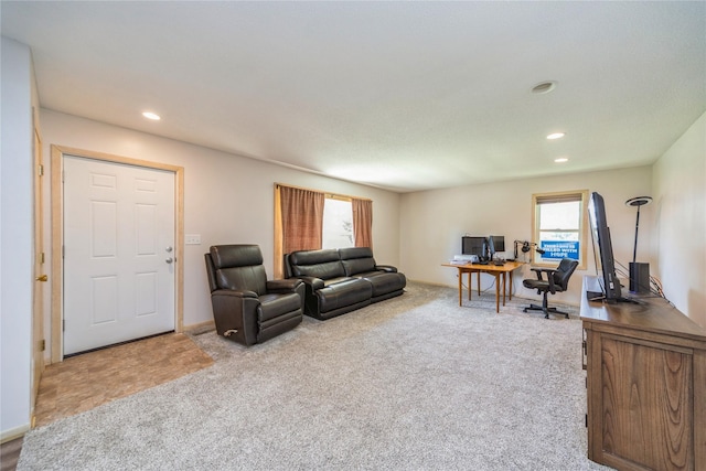 612 W Pleasant St, Pleasantville, IA 50225 - carpeted living room with a desk and recessed lighting