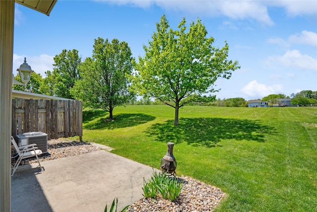 view of yard with a patio area and central AC unit