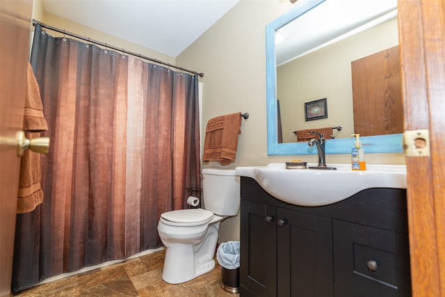 full bath with toilet and vanity