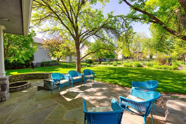 view of patio with an outdoor fire pit