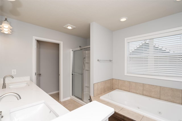 full bathroom featuring a shower stall, a whirlpool tub, tile patterned floors, recessed lighting, and double vanity