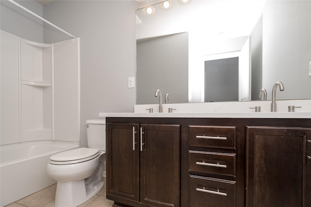 full bath with toilet, tile patterned floors, double vanity, and shower / bathtub combination