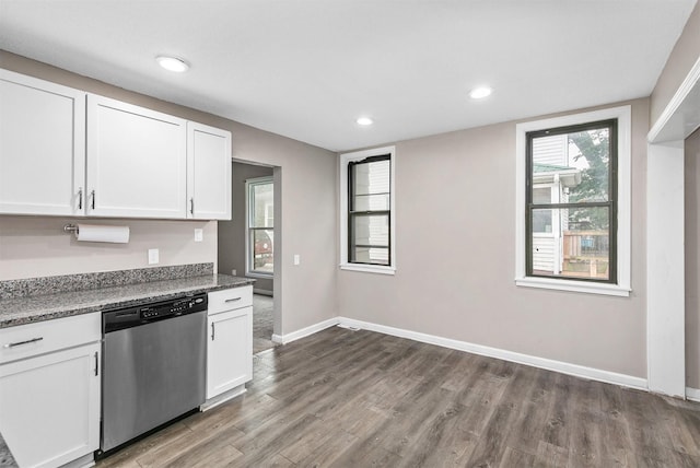 1360 E 9th St, Des Moines, IA 50316 - kitchen with stainless steel dishwasher, wood finished floors, white cabinets, recessed lighting, and stone countertops