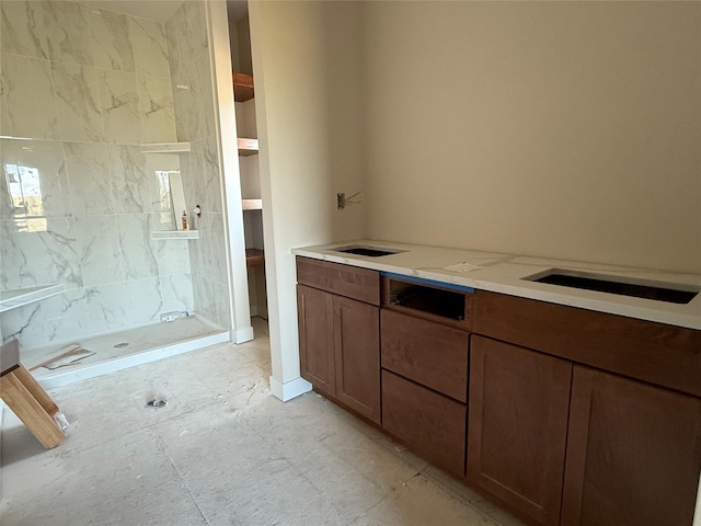 bathroom featuring a shower stall