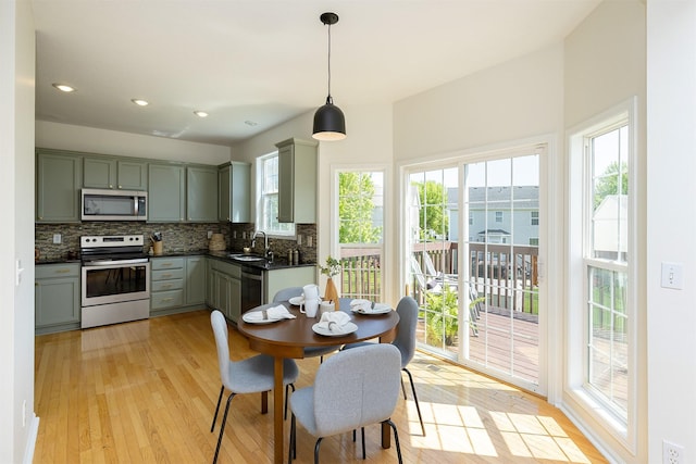 213 Bridgewood Dr, West Des Moines, IA 50266 - dining room with plenty of natural light, light wood-style floors, and recessed lighting