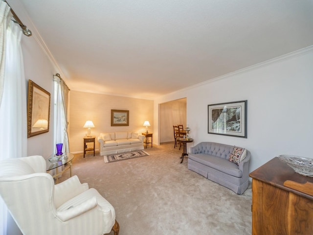 living area with carpet flooring and ornamental molding