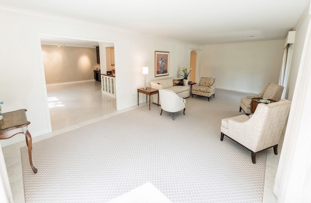 living room featuring light colored carpet and crown molding