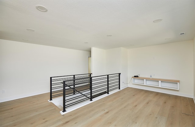4727 Hillsdale Dr, Urbandale, IA 50322 - bonus room featuring light wood finished floors and baseboards