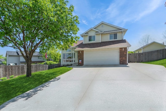 1249 NW 108th Cir, Clive, IA 50325 - traditional home featuring driveway, brick siding, a garage, and a shingled roof