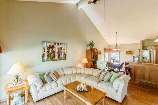 1249 NW 108th Cir, Clive, IA 50325 - living room with high vaulted ceiling, beamed ceiling, a ceiling fan, wood finished floors, and a chandelier