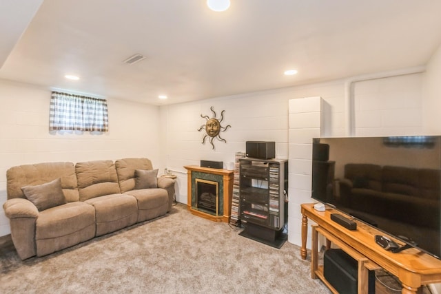 1249 NW 108th Cir, Clive, IA 50325 - living area with carpet floors, concrete block wall, and recessed lighting