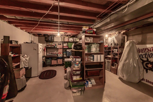 1249 NW 108th Cir, Clive, IA 50325 - unfinished basement featuring freestanding refrigerator
