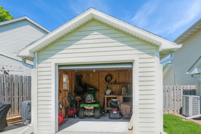 1249 NW 108th Cir, Clive, IA 50325 - view of outdoor structure with fence, an outbuilding, and central AC