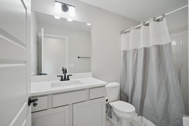 bathroom featuring vanity, toilet, and shower / bathtub combination with curtain