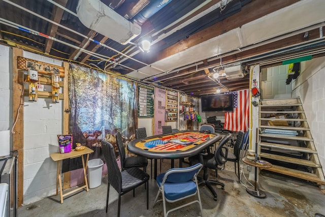 1523 Allison Ave, Des Moines, IA 50314 - unfinished below grade area featuring concrete block wall and stairs