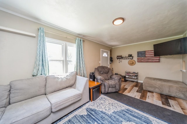 1523 Allison Ave, Des Moines, IA 50314 - living area with wood finished floors, crown molding, and baseboards