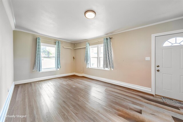 1523 Allison Ave, Des Moines, IA 50314 - entryway featuring hardwood / wood-style floors, baseboards, and ornamental molding